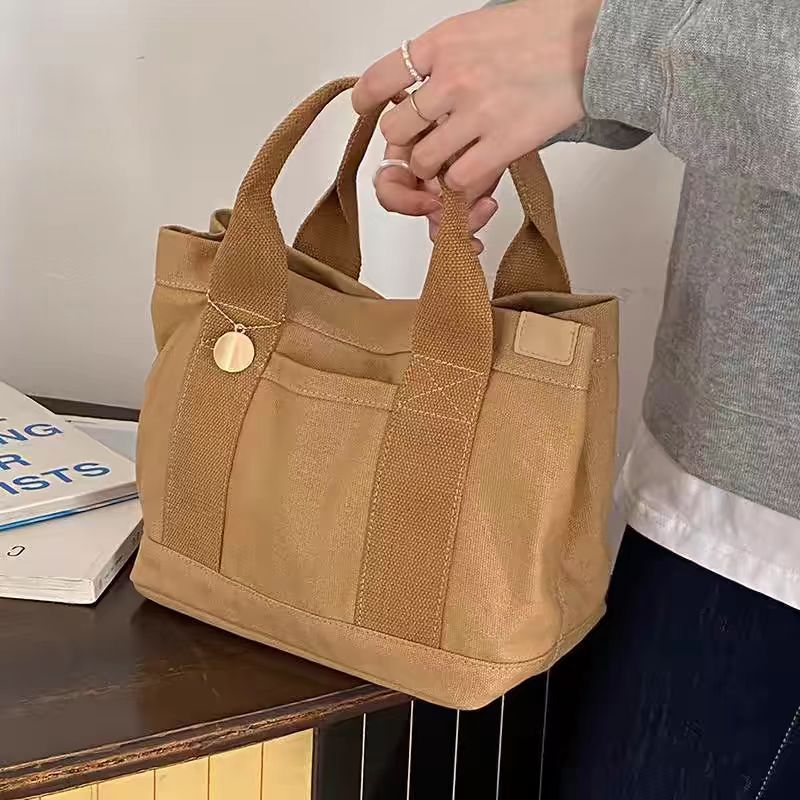 Bolso de mano de lona simple,  - Women'S Reebok Bags reseña y precio